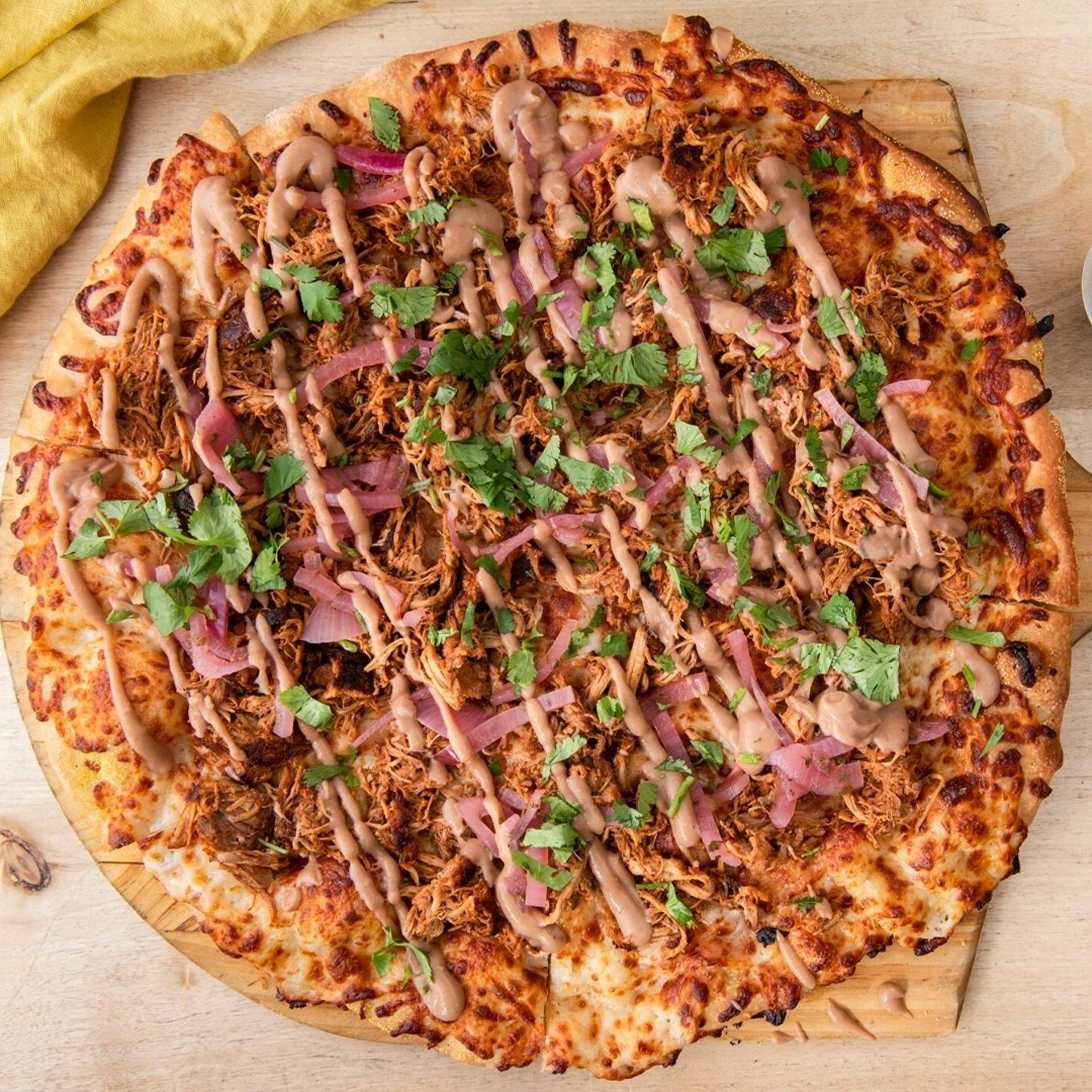 Two culinary Jefes, one pizza